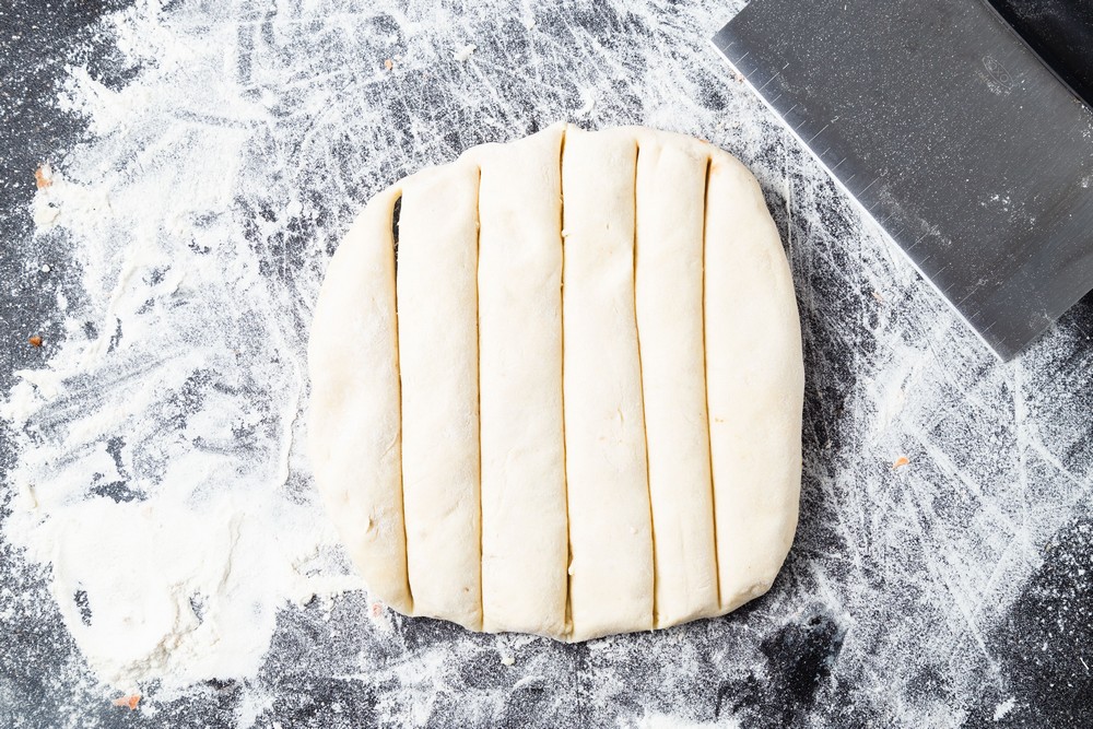 https://cookingwithcarbs.com/wp-content/uploads/2021/07/pizza-dough-garlic-bread-sticks-setup1-min.jpg